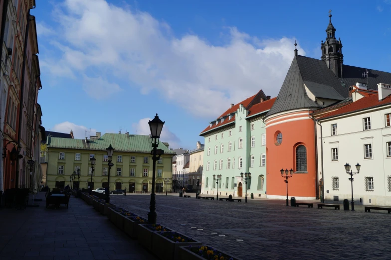 many buildings in a town with a clock tower