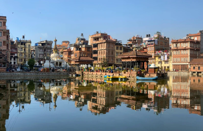 an image of a body of water in the city