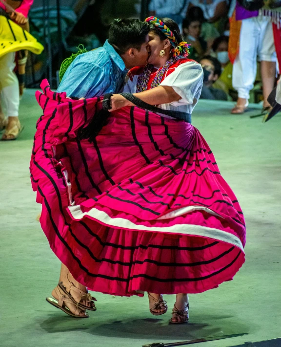 two people in the middle of a dance