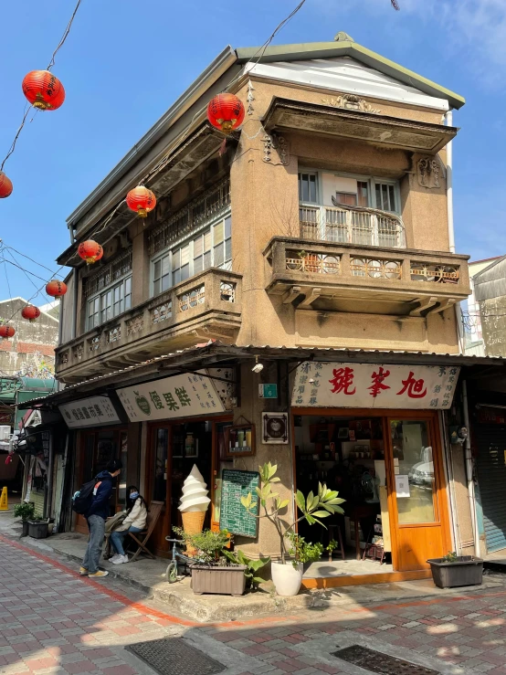 an image of a chinese store in the street