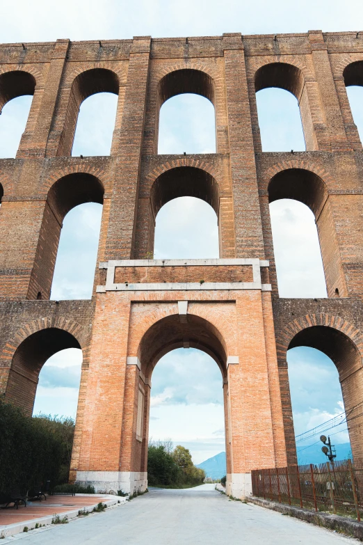 a po of an ancient structure with arched windows