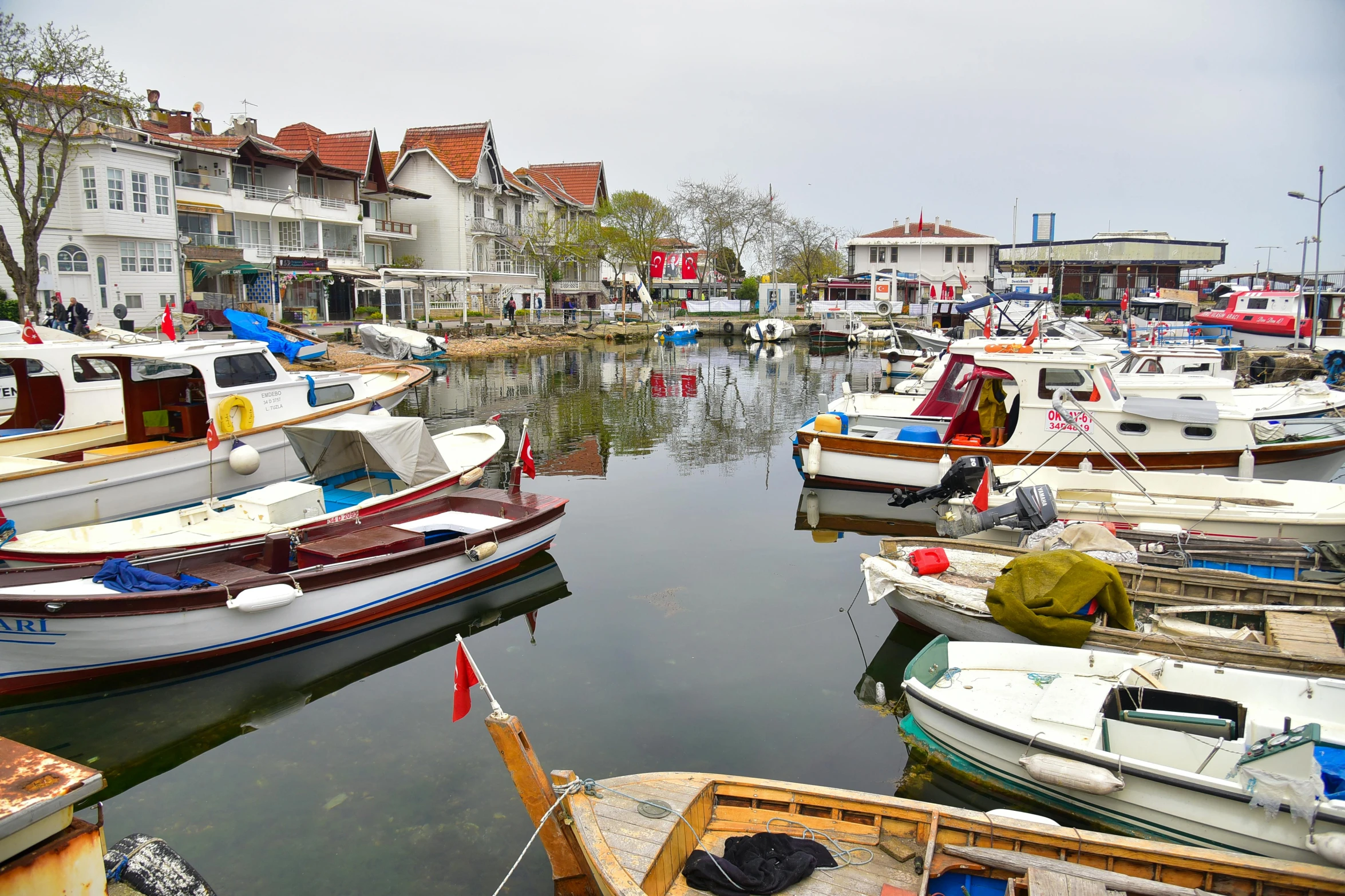 a bunch of boats that are sitting in the water