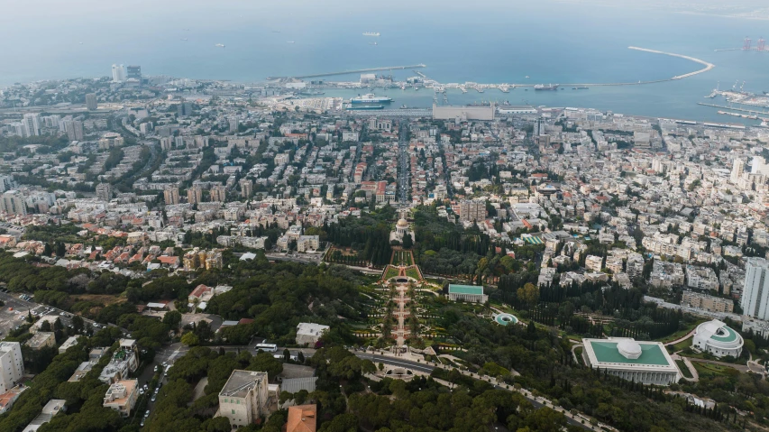 an aerial s of a big city surrounded by water