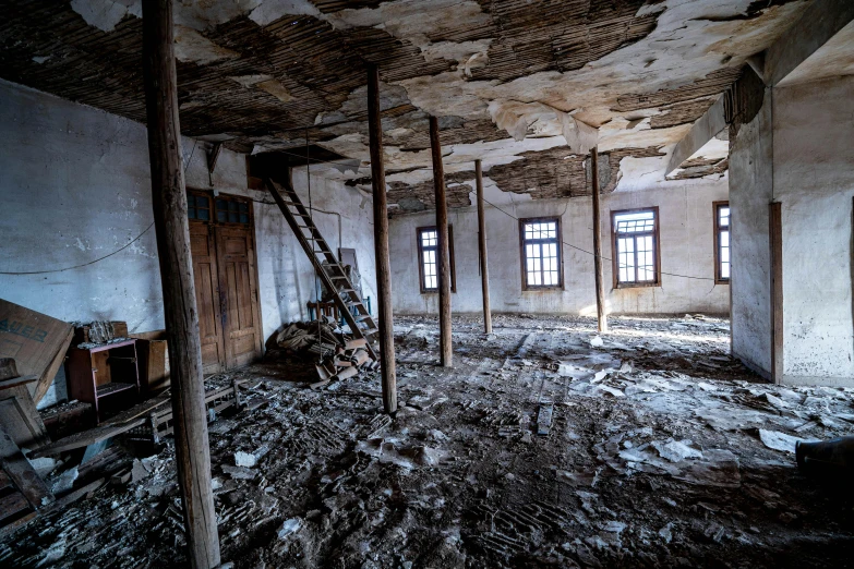 an empty room that is almost completely filled with dirt