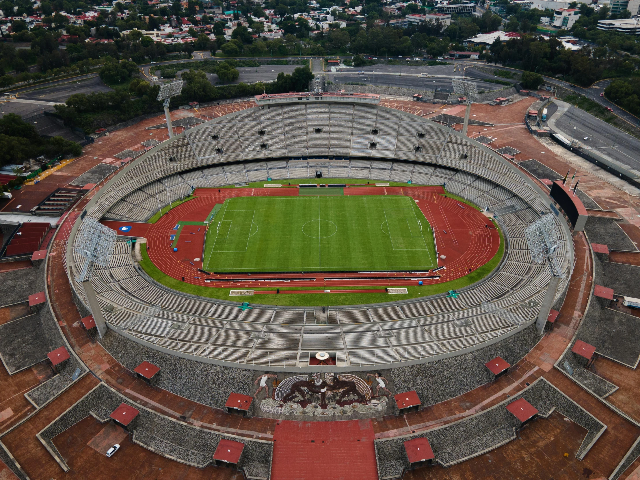 an aerial view of a stadium, with many empty seats