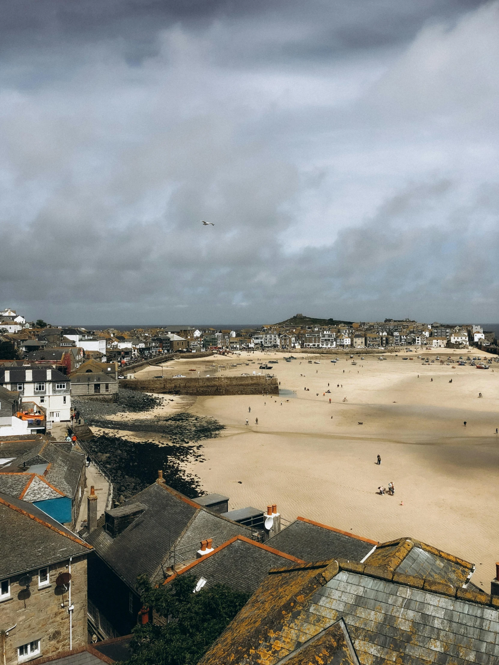 the view over the top of an empty beach