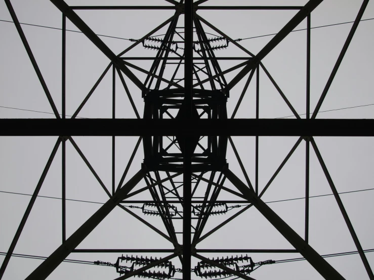 a view up inside of an electric tower