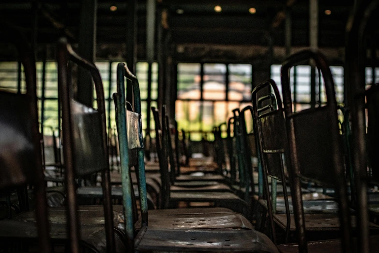 an old and abandoned bus with several empty seats