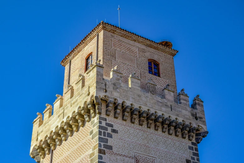 the tall tower has two clocks on it