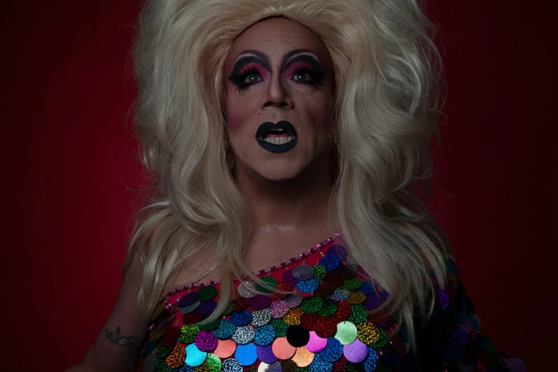 a woman in a drag up costume