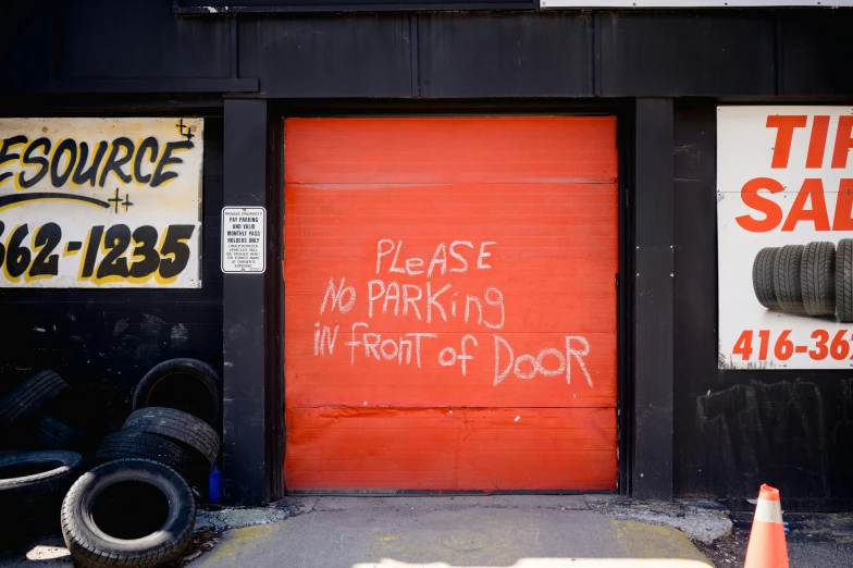 graffiti on the wall of a garage door