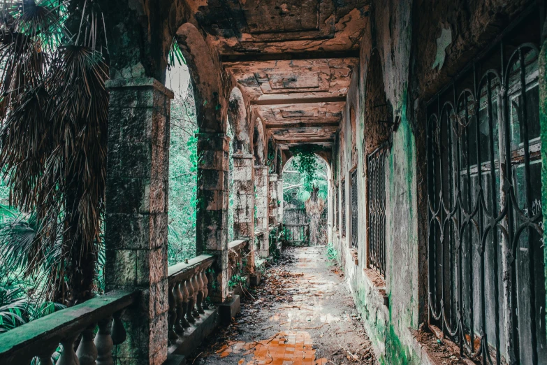 a walkway in an abandoned building is shown