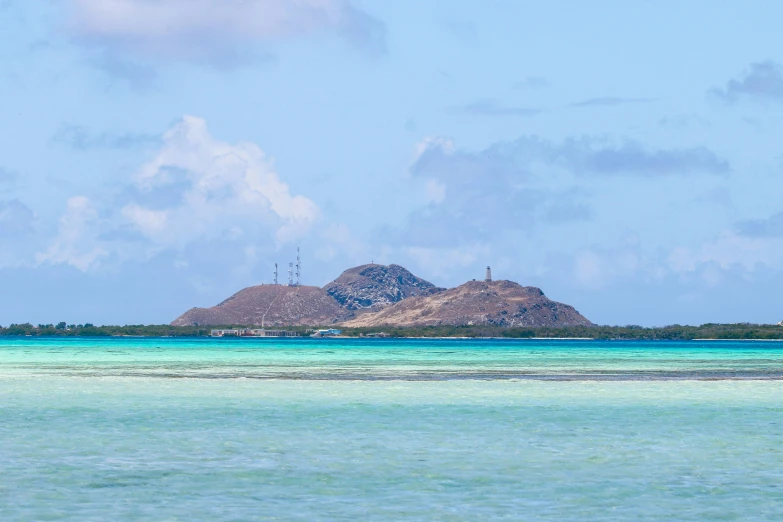 a view of two small hills that have been placed in the distance