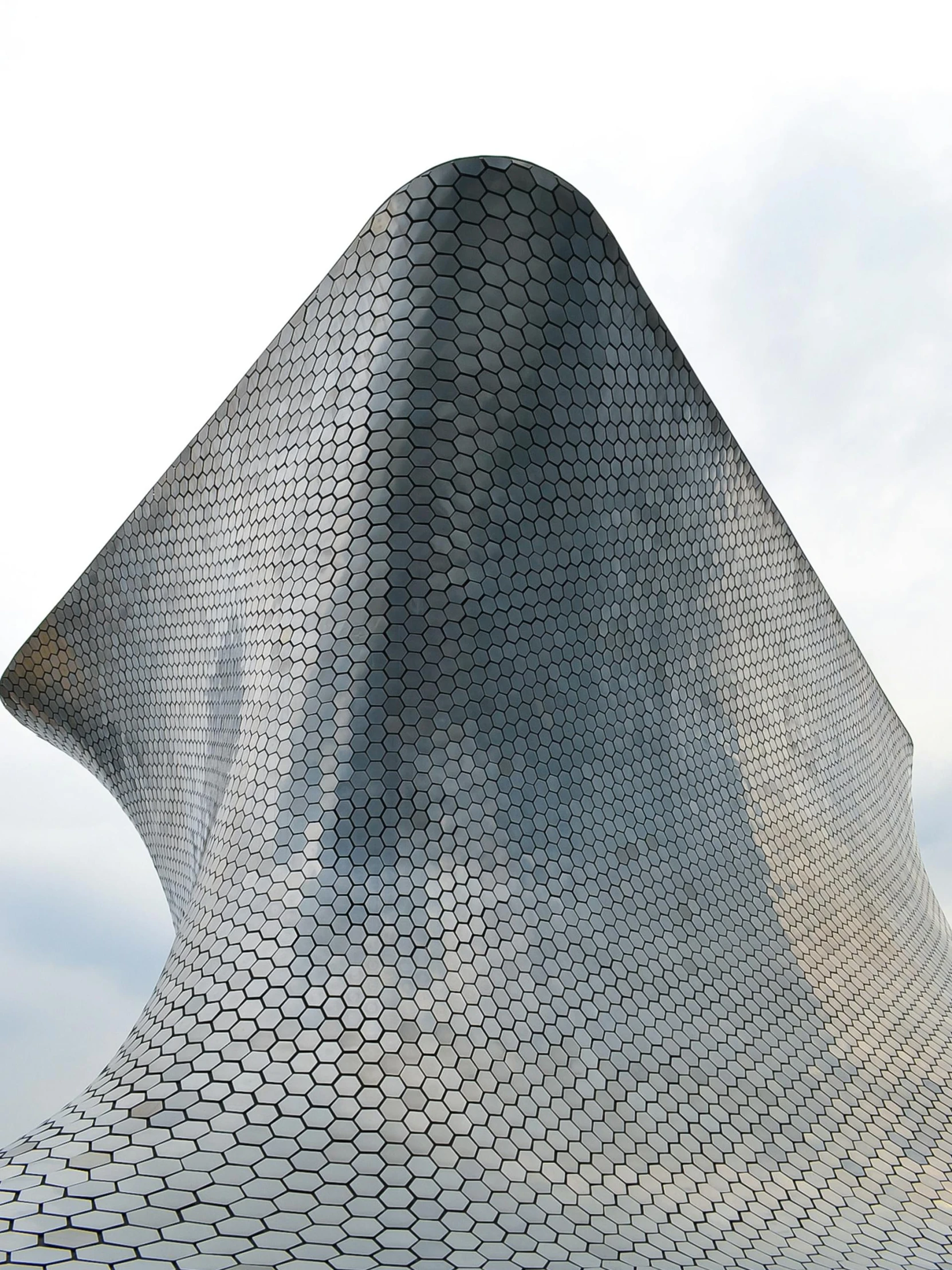 a metal sculpture is shown with large squares