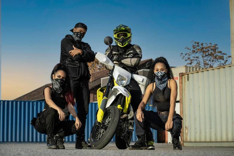 the motorcycle team, the three motorcycle riders in their protective gear