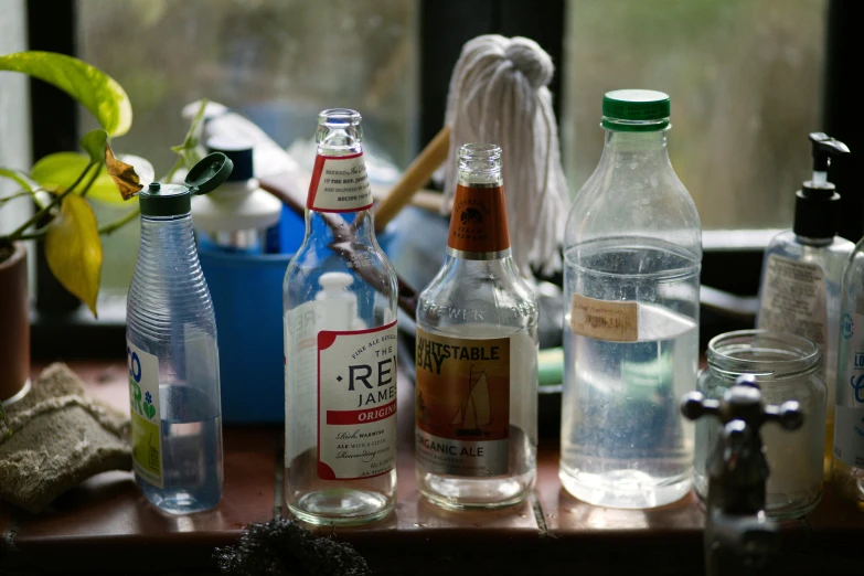 bottles of alcohol are lined up on a table