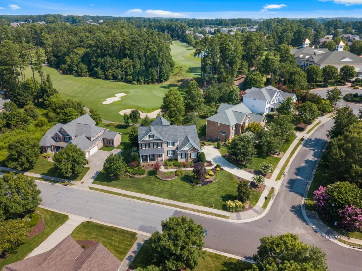 the golf course, golf club and homes in a golf course