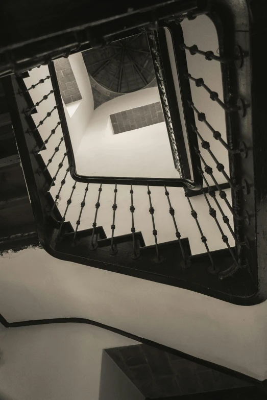 a stairwell area in a building with a railing