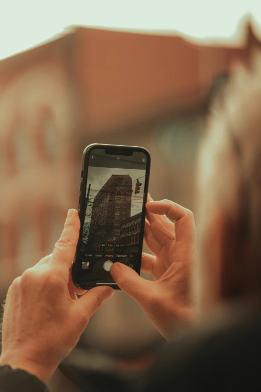 a person looking at a video on their phone