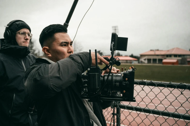 a man taking pictures on a video camera