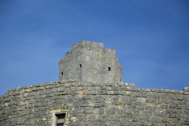 the window and wall is above a small door