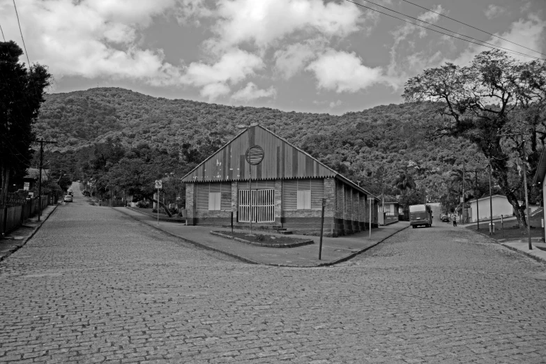 a vintage po of a building in the countryside