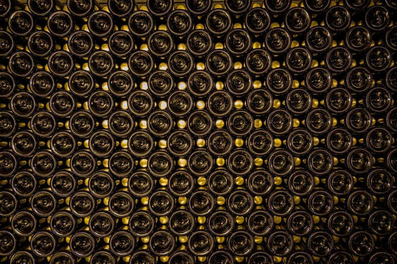 a wall covered in many circles with lights