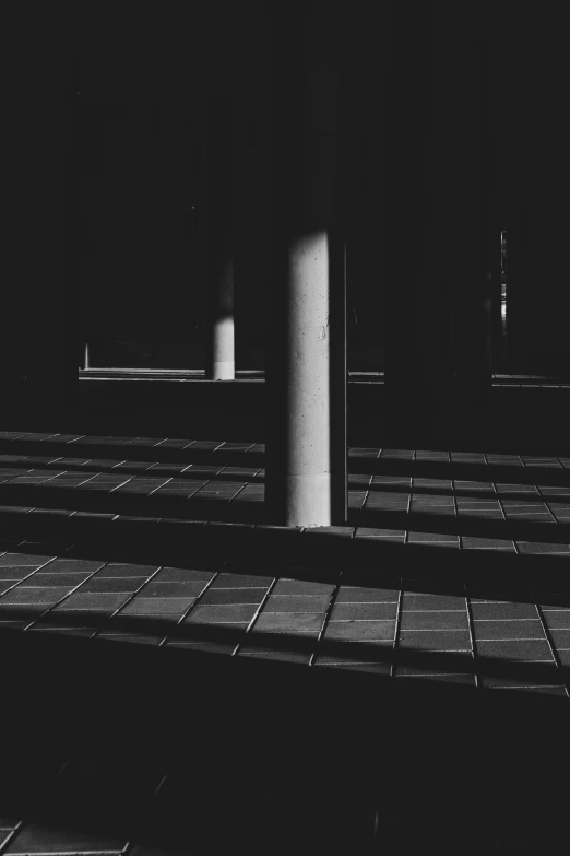 the image is black and white of an empty outdoor space