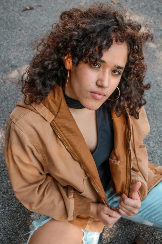 an image of a woman with curly hair