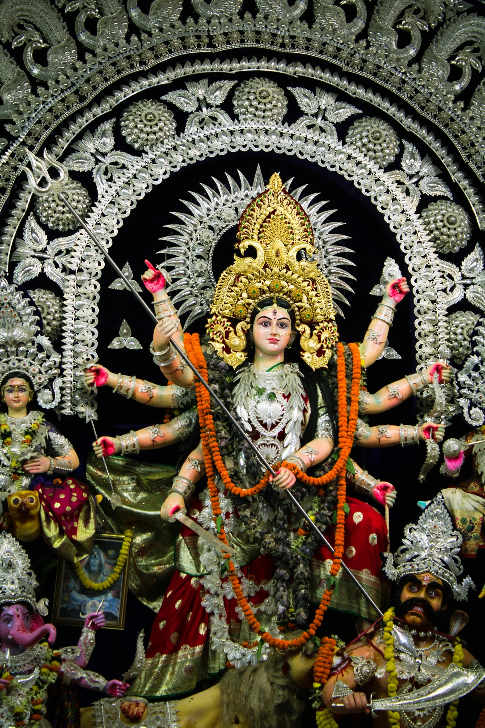 statues of deities in hindu garb on display