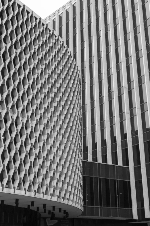 an abstract black and white pograph of a building in a city