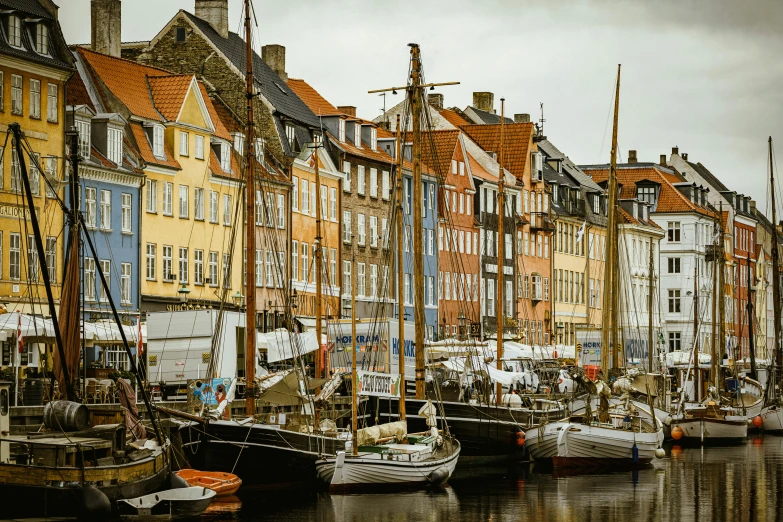 several boats are docked in a dock area