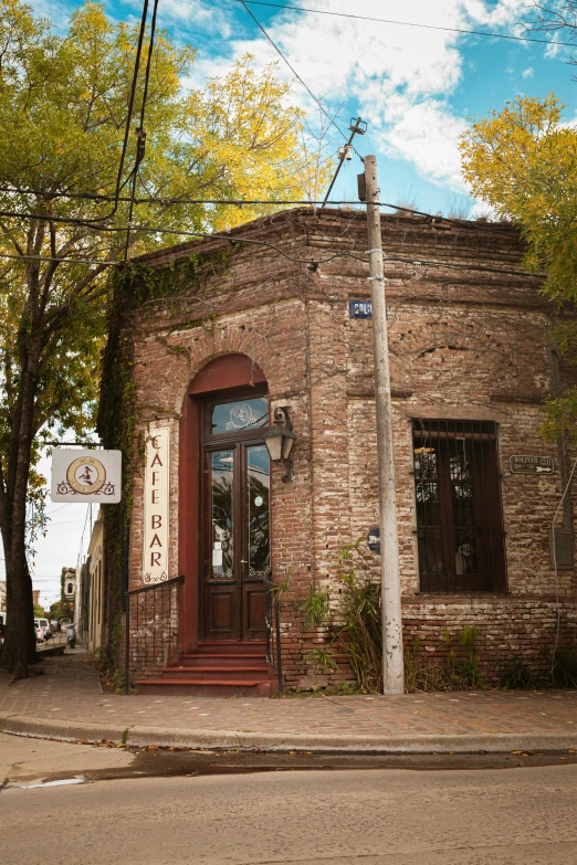 a brick building has an asian writing on the side