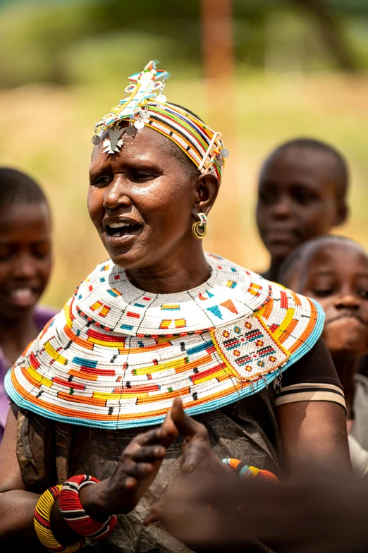 a group of people with many patterns on their head