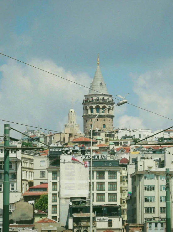 a building in a foreign city with a tower