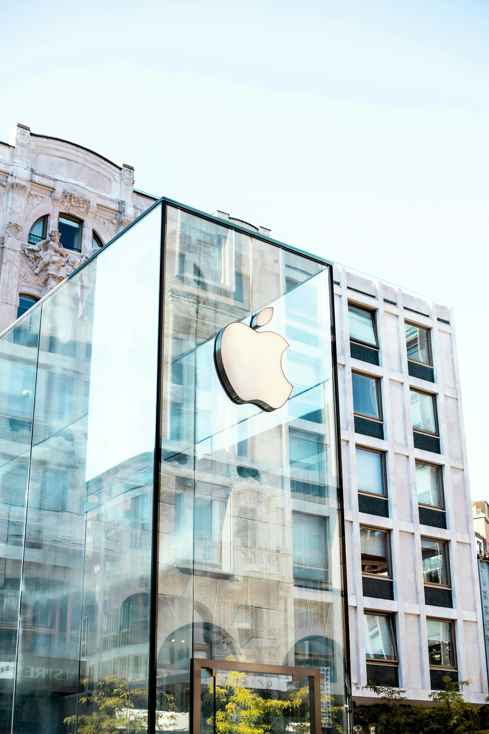 an apple store is shown on a city street