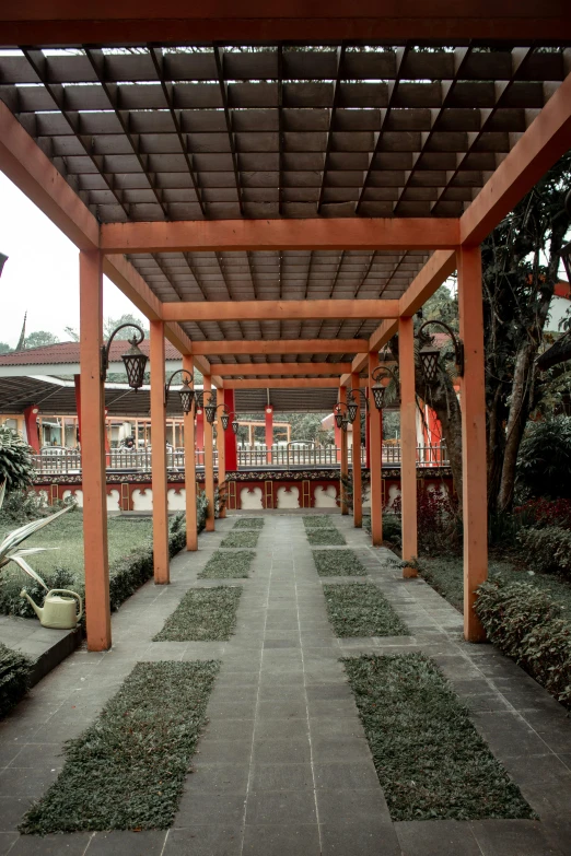 an open walkway leading to several pagodas