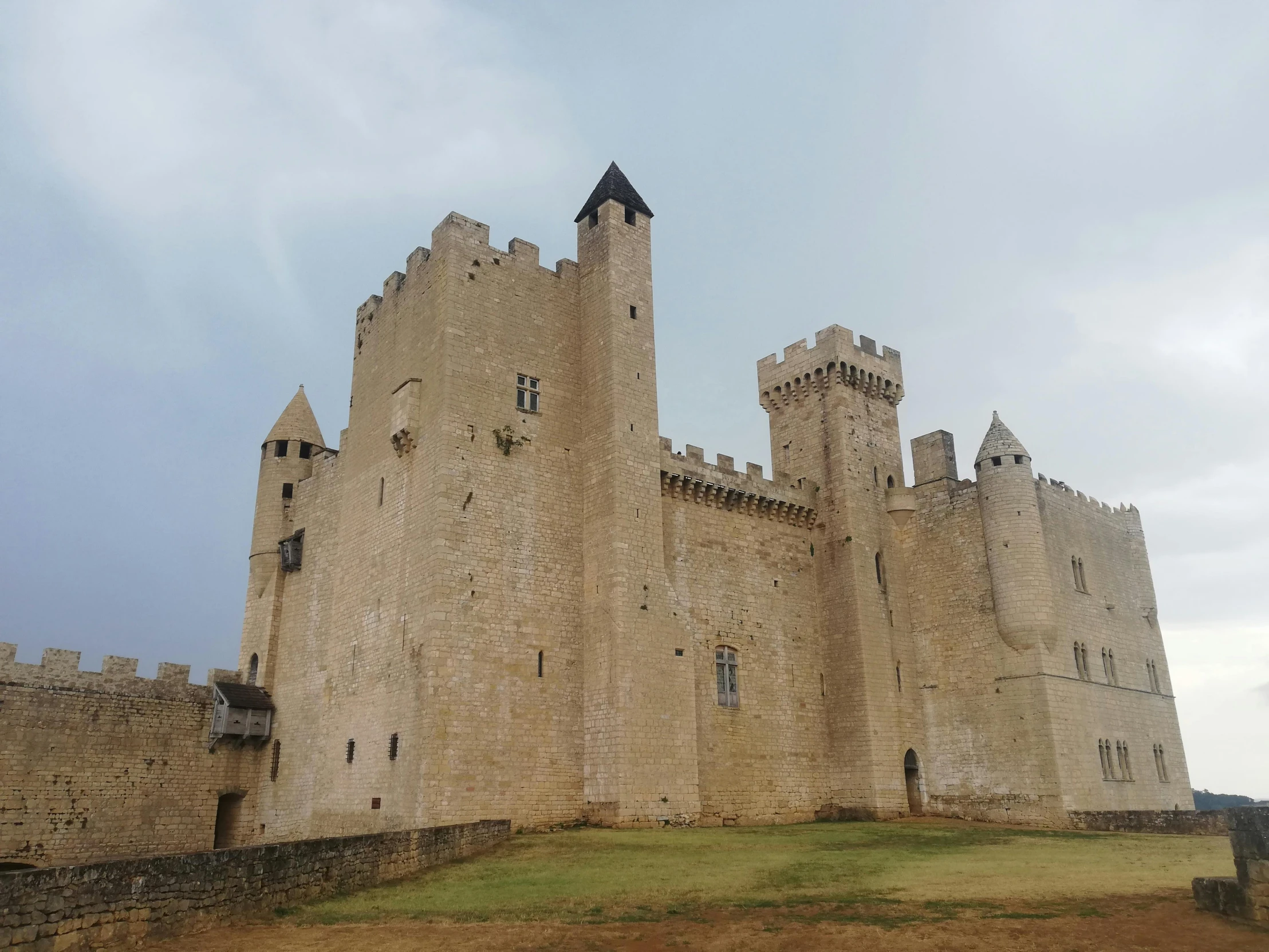 an old castle that is sitting on a hill