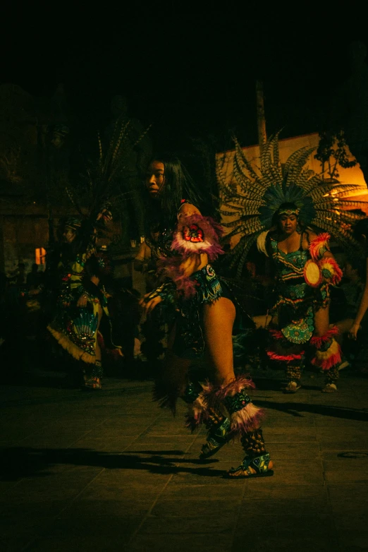 an image of some dancing people on a street