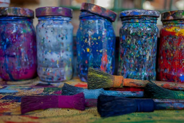 there are many vases that have been decorated with various colors