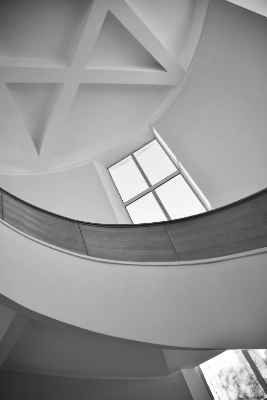 a black and white po of windows in a building