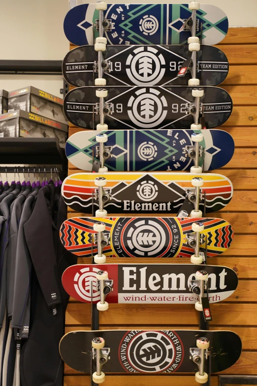 skateboards on display at the store in front of their owner