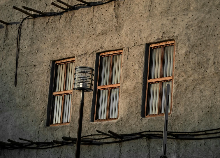 a house with several windows and a lantern