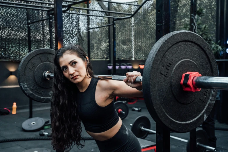 a women who is doing some type of sport exercise