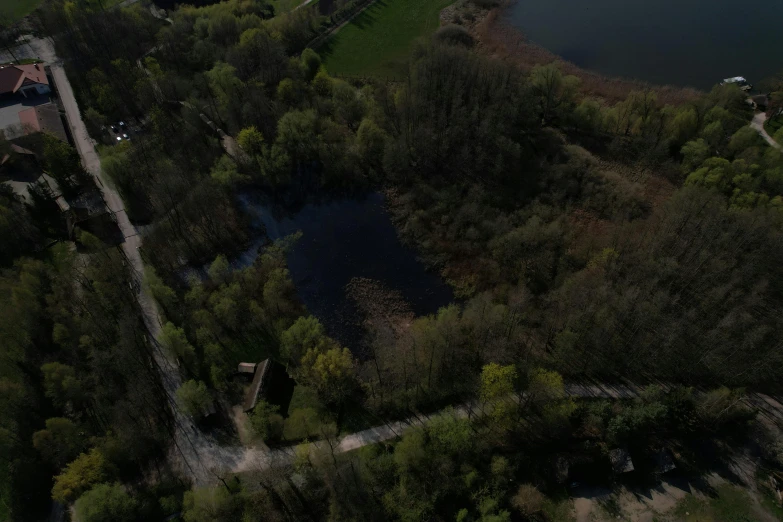 an aerial view of the water and land