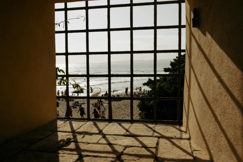 the view out of an outdoor prison cell door