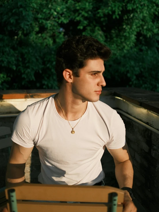 a man with a white shirt and a black tie