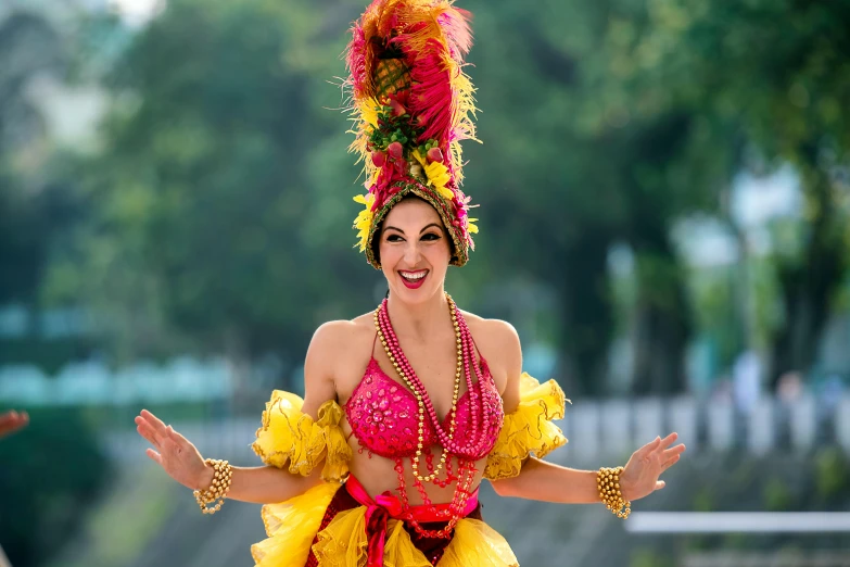 a woman with elaborate makeup and a carnival costume