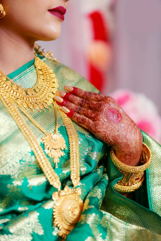 an indian bride putting her hand together