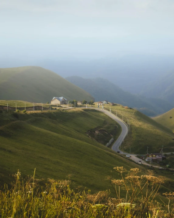 a mountain with hills and an interstate going down it